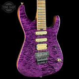 Purple electric guitar with a visible brand logo on a black background