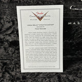 Fender Custom Shop Master Design 1950s Relic Stratocaster information sheet on a textured surface