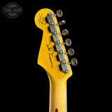 Guitar headstock with tuning pegs on a black background, featuring the 'Tone Shop' logo.