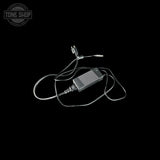 A silver metal audio tone stack or equalizer module with attached cables, shown on a solid black background. A 'TONE SHOP' watermark is visible in the top-left corner.