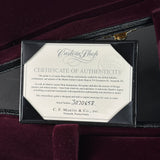 Certificate of Authenticity for a Martin guitar on a dark background
