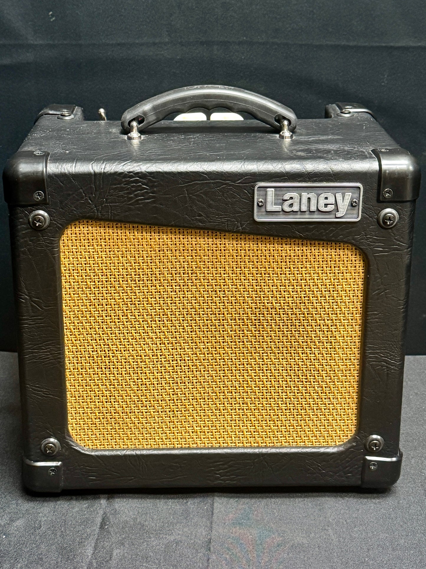 Guitar amplifier with 'Laney' branding on a dark background