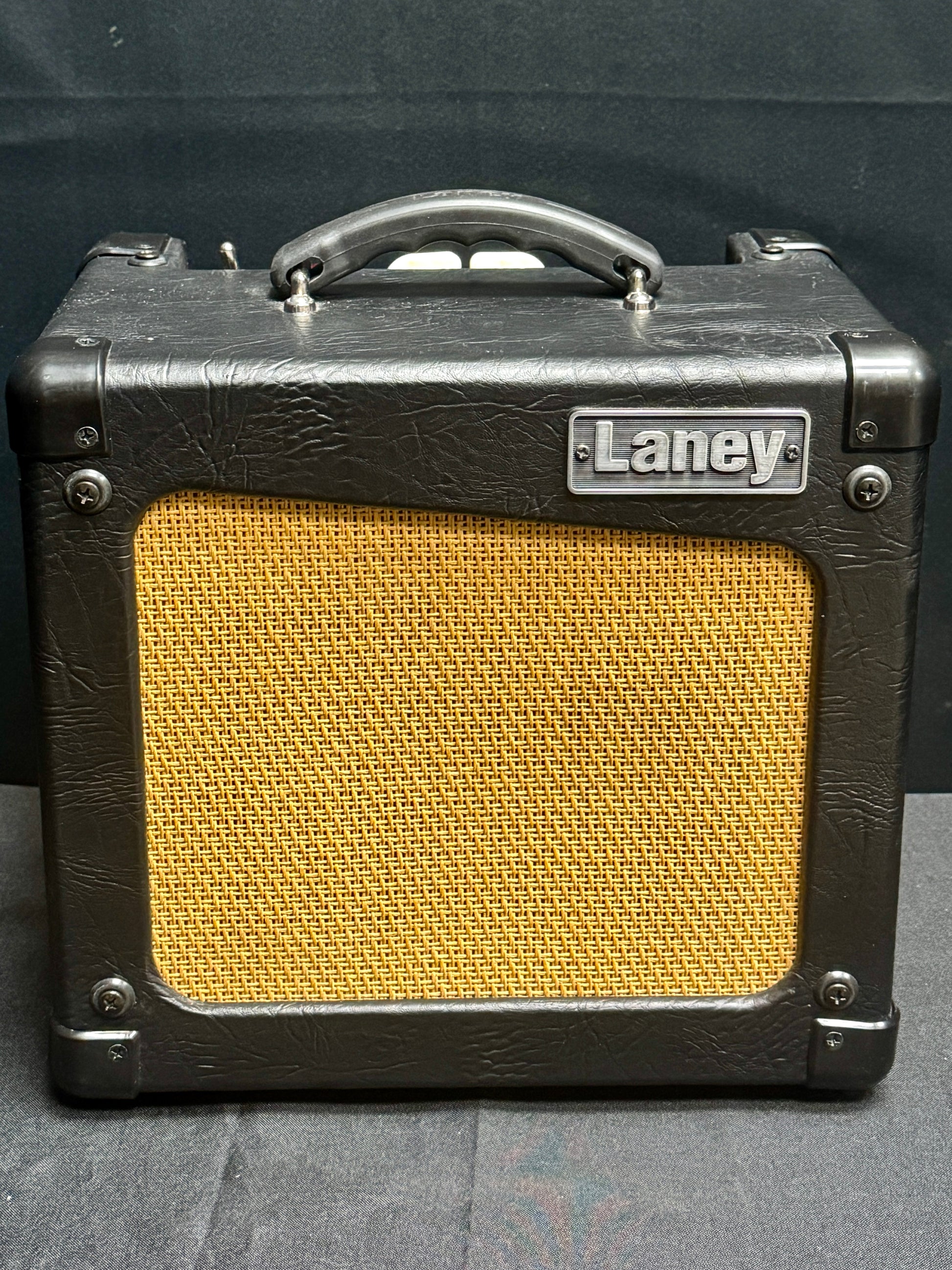 Guitar amplifier with 'Laney' branding on a dark background