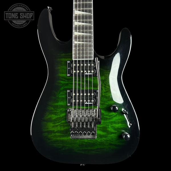 A high-gloss electric guitar with a vibrant green and black flame maple top, shown against a solid black background. The brand logo 'TONE SHOP' is visible in the top-left corner.