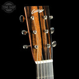 Collings guitar headstock with brand name on a black background