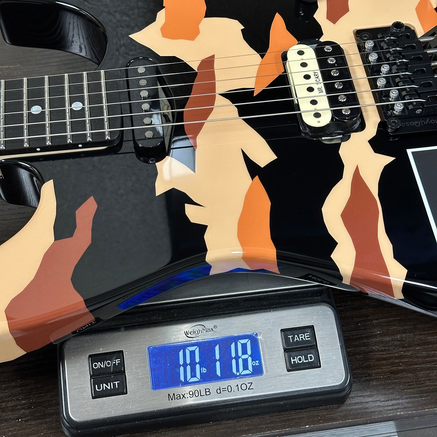 ESP Original Series George Lynch Desert Eagle w/case E0450252 on a scale reading 10lbs 11.8 oz