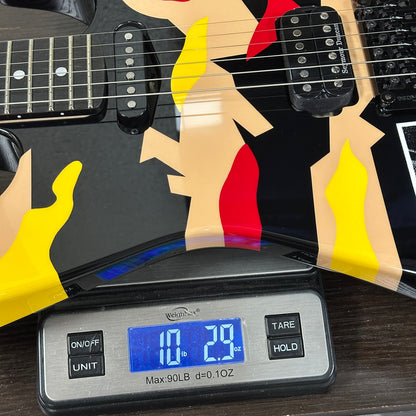 Closeup of ESP Original Series George Lynch Kamikaze 1 w/case E2580242 on a scale weighing 10 lbs 2.9 oz