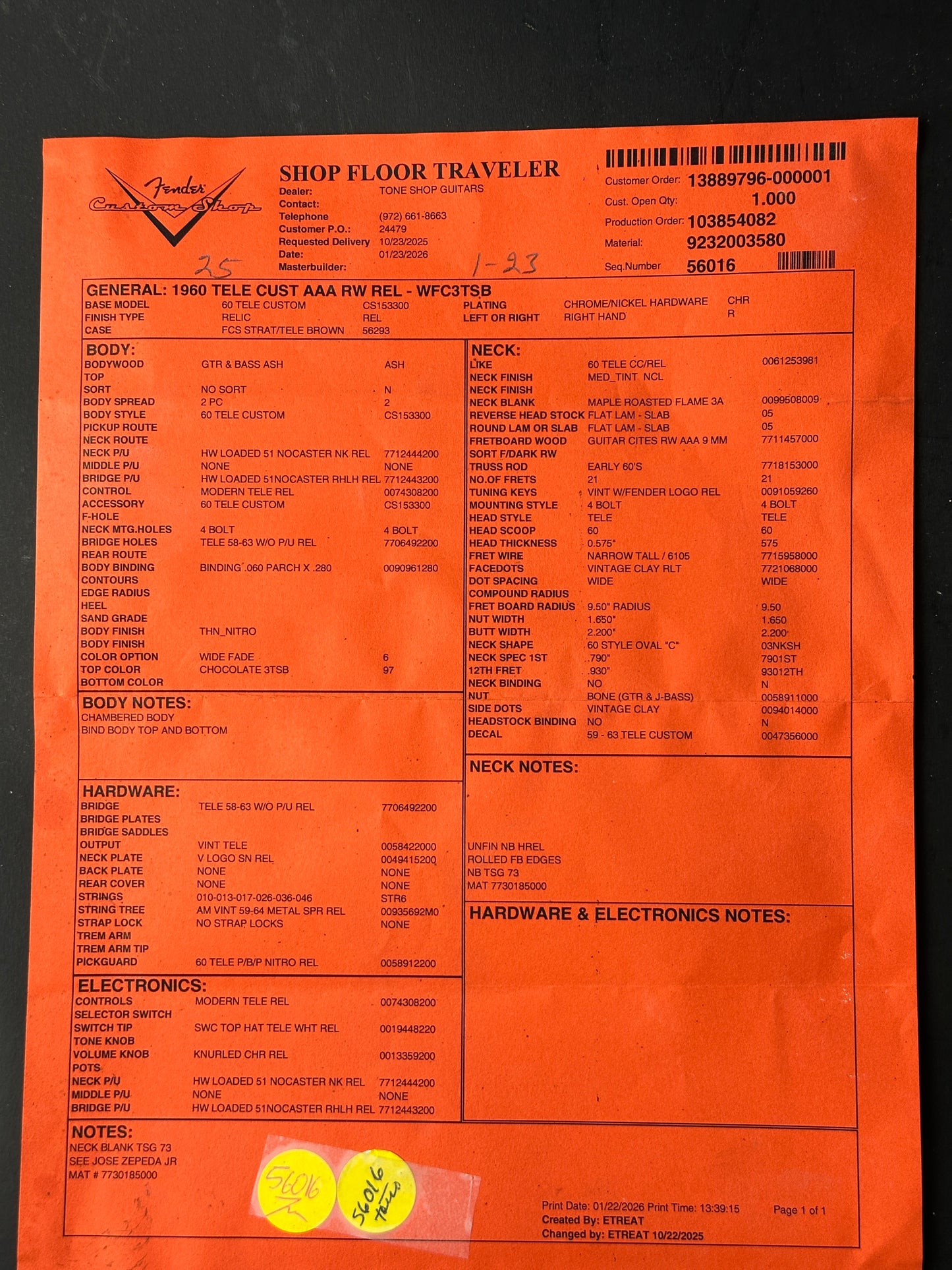 Orange sheet with text and a yellow label on a black background