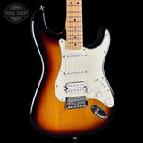 Electric guitar with a sunburst finish on a black background, featuring the Tone Shop logo.