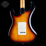 Electric guitar with a sunburst finish on a black background, featuring the Tone Shop logo.