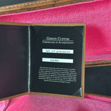 Gibson Custom Certificate of Authenticity inside a pink case