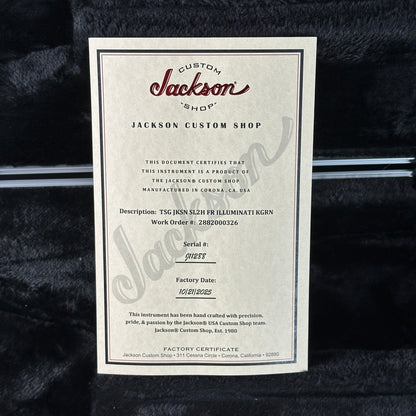 Jackson Custom Shop guitar certificate on a textured black surface