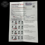 A printed product manual page for the Dunlop 'B Boost effect, showing wiring diagrams, gain settings, and notes with brand logos for Tone Shop and Shiny Magic.