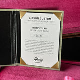 Gibson Custom Certificate of Authenticity for Murphy Lab Ultra Light Aging on a pink background