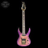 Purple electric guitar on a black background with 'Tone Shop' logo.