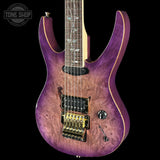 Purple electric guitar with a visible brand logo on a black background