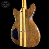 The back of a double-cutaway electric guitar made of rich brown wood with two vertical light wood stripes, shown against a solid black background.