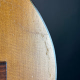 Close-up of a wooden surface with a dark background