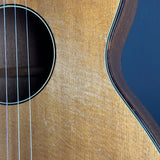 Close-up of an acoustic guitar's soundhole and body