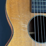 Close-up of an acoustic guitar's soundhole and body
