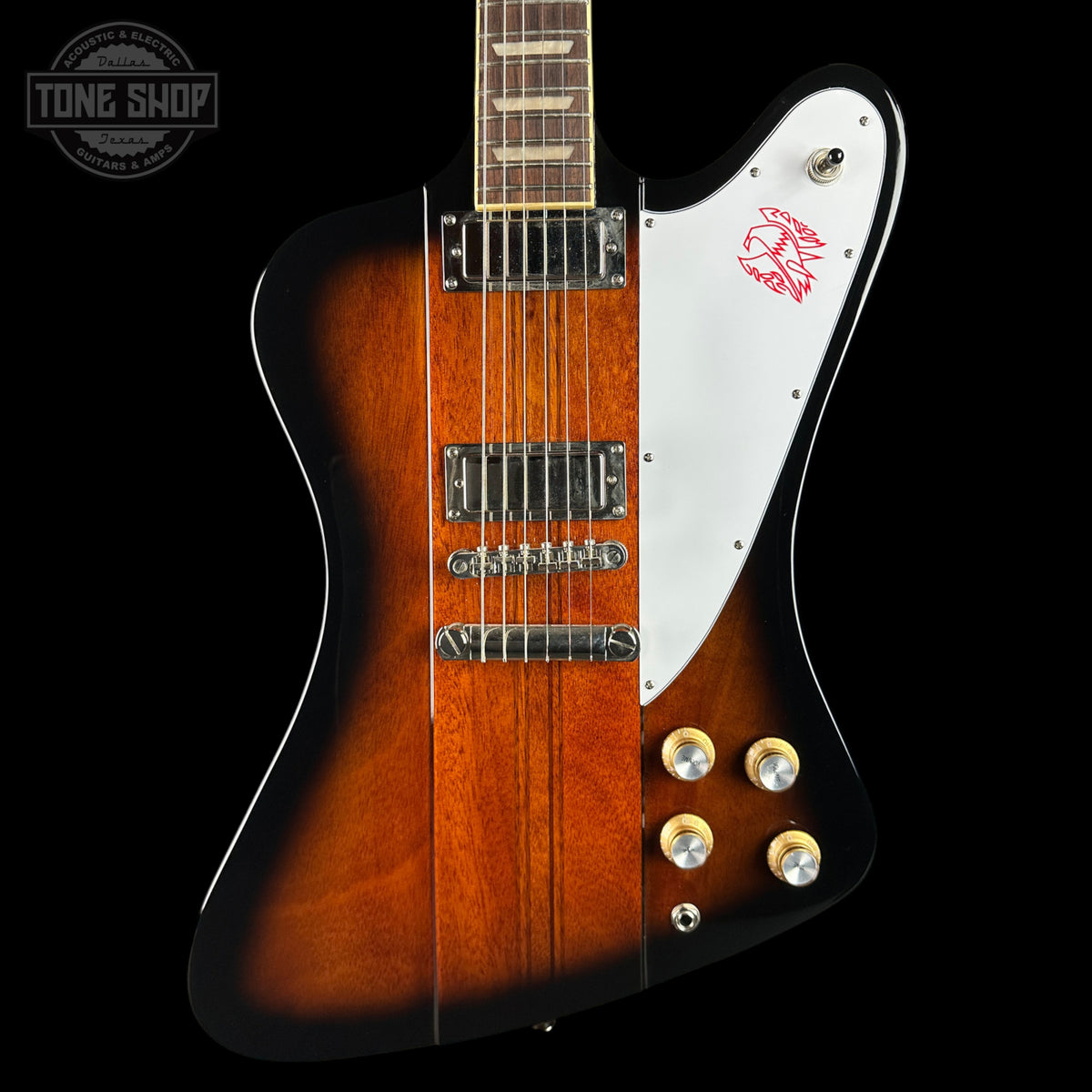 Gibson electric guitar with a sunburst finish on a black background, featuring the Gibson logo.