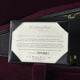 Certificate of Authenticity for a Martin Custom Shop guitar inside a guitar case.