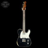 A classic Fender Telecaster-style electric guitar with a black body, white pickguard, and a brown wood neck, shown against a solid black background. A 'TONE SHOP' watermark is visible in the top-left corner.