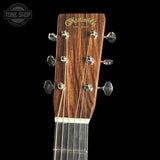 Guitar headstock with 'Martin' logo on a black background
