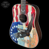Acoustic guitar with American flag and eagle design on a black background