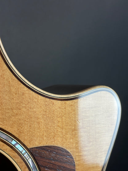 Wear on cutaway of Used Taylor 812ce Natural.
