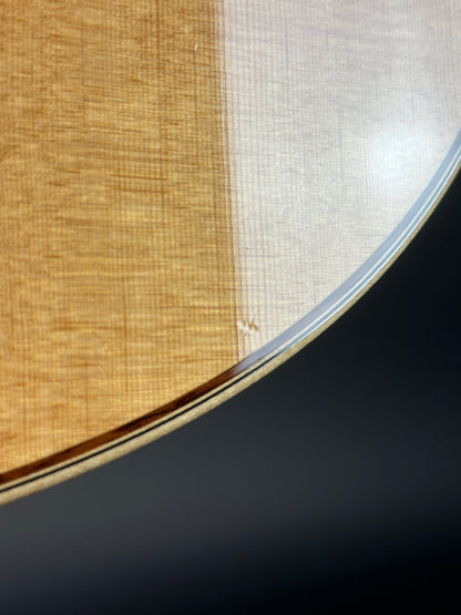 Wear on body of Used Taylor 812ce Natural.