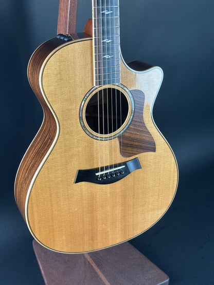 Acoustic guitar with a dark blue background