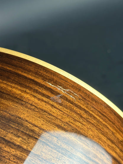 Damage on bottom of Used Taylor 812ce Natural.