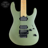 An electric guitar with a matte sage green body, maple neck, and black hardware, shown against a solid black background with a Tone Shop watermark in the top-left corner.