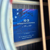 Blue label on a guitar with 'C.F. Martin & Co.' branding