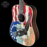 Acoustic guitar with American flag and eagle design on a black background
