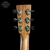 Guitar headstock with tuning pegs on a black background, featuring 'Tone Shop' logo.