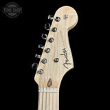 Fender guitar headstock on a black background with 'Tone Shop' logo.
