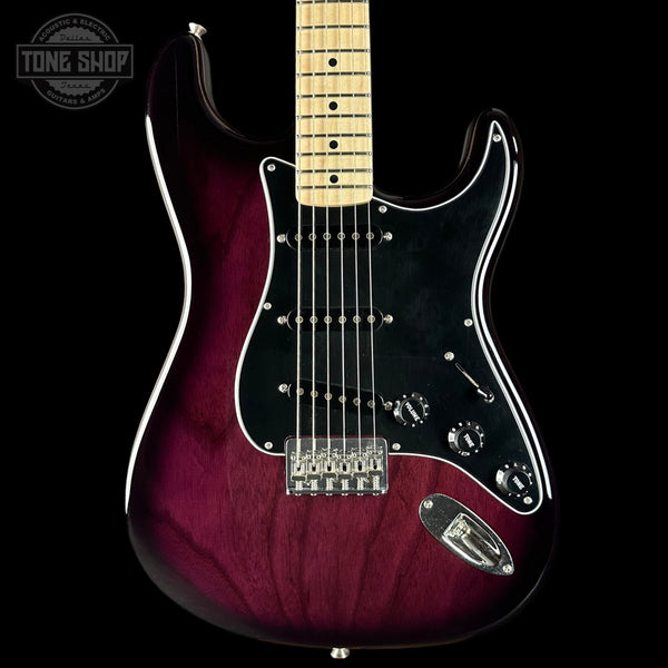 Electric guitar with a maroon body and black pickguard on a black background, featuring the Tone Shop logo.