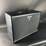 Boss guitar amplifier cabinet on a gray background