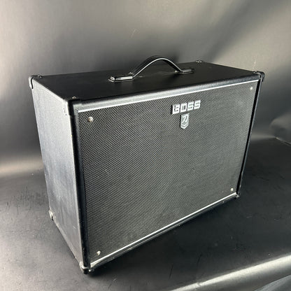 Boss guitar amplifier cabinet on a gray background