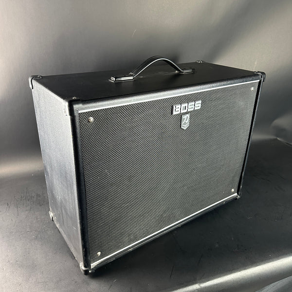 Boss guitar amplifier cabinet on a gray background