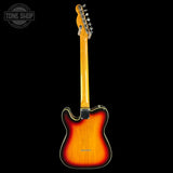 A classic Fender Telecaster electric guitar shown from the back, featuring a vibrant sunburst finish that transitions from bright orange to dark brown, set against a solid black background.