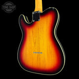 Rear view of a Fender Telecaster electric guitar with a classic sunburst finish, showing the amber and black wood grain, white binding, and tailpiece on a black background.