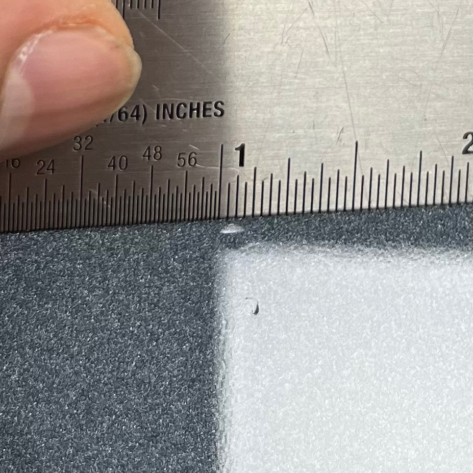 Ding on front of Used 2018 Music Man Stringray RS Charcoal Frost Roasted Neck RW Guitar w/Case TFW2641