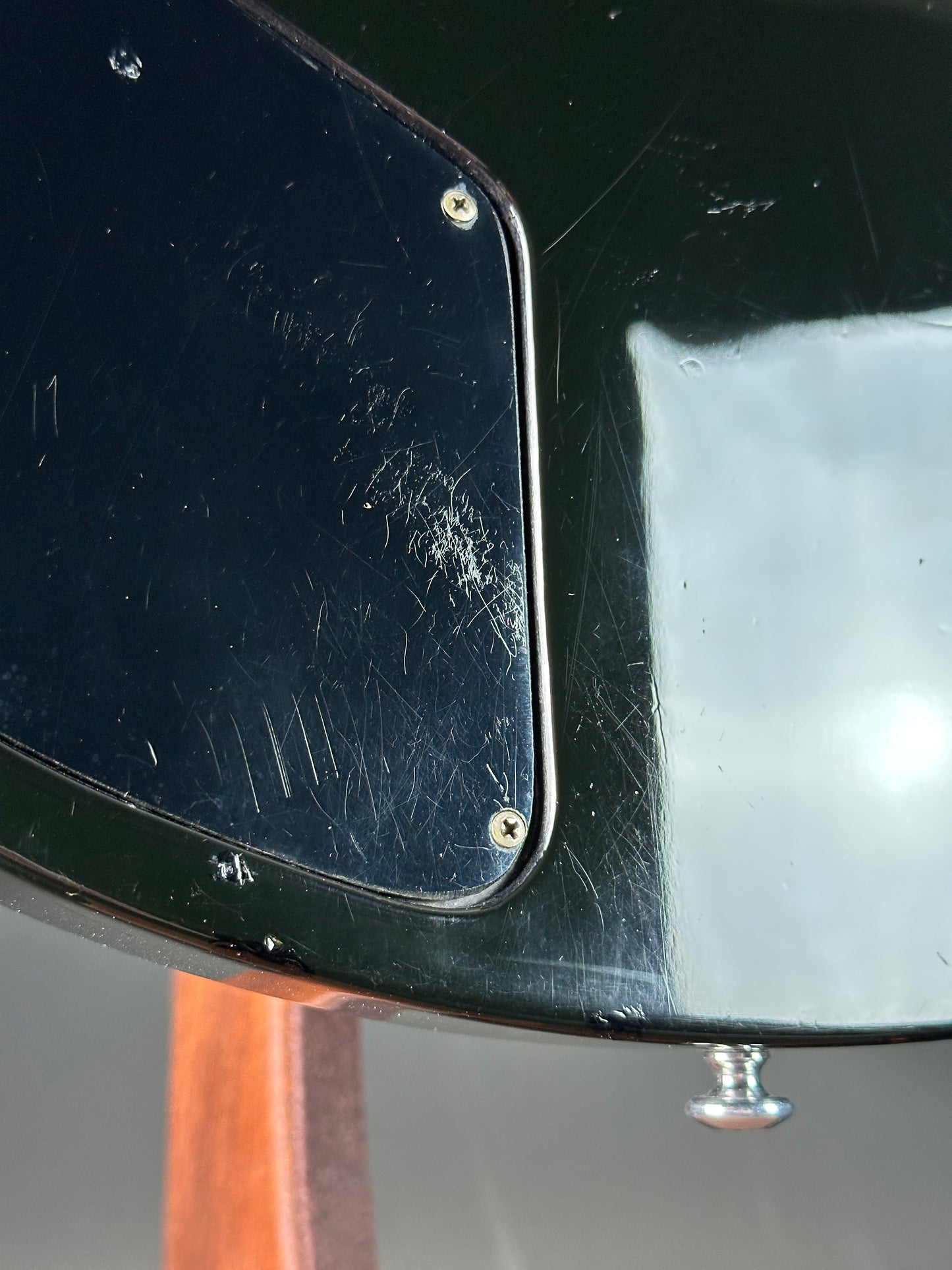 Scratched black surface with metallic elements