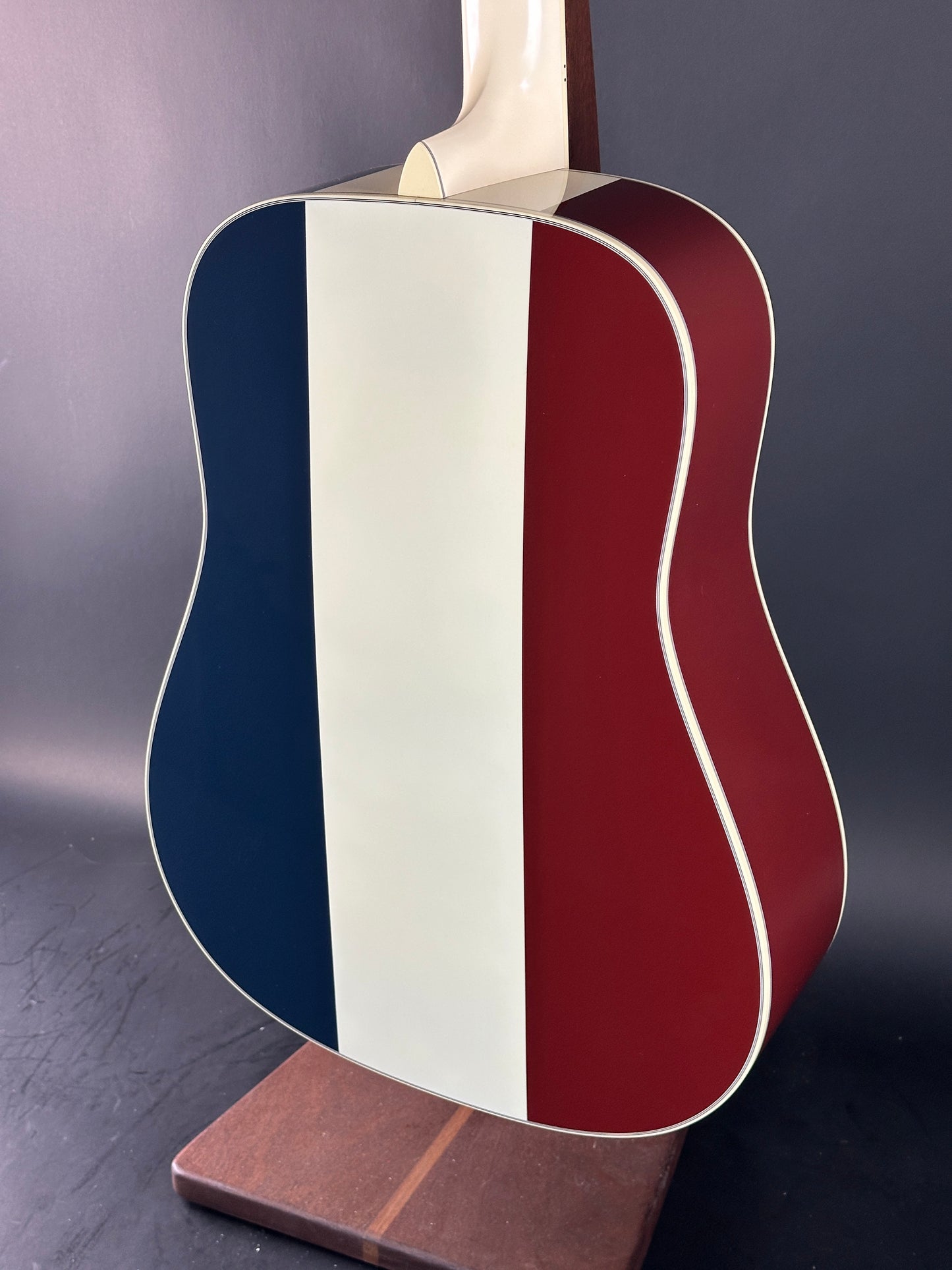 Back angle of Used Martin Custom Shop Dread Red/White/Blue Sitka/EIR.
