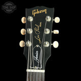 Gibson Les Paul Junior guitar headstock on a black background
