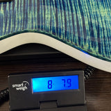 PRS Tremonti Stoptail 10 Top River Blue Pearl on scale displaying weight.