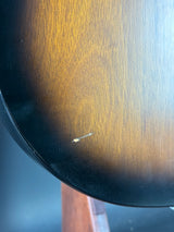 Close-up of a wooden surface with a small insect on it